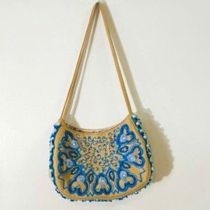 Vintage Braciano purse embellished with rhinestones, faux pearls and feathers